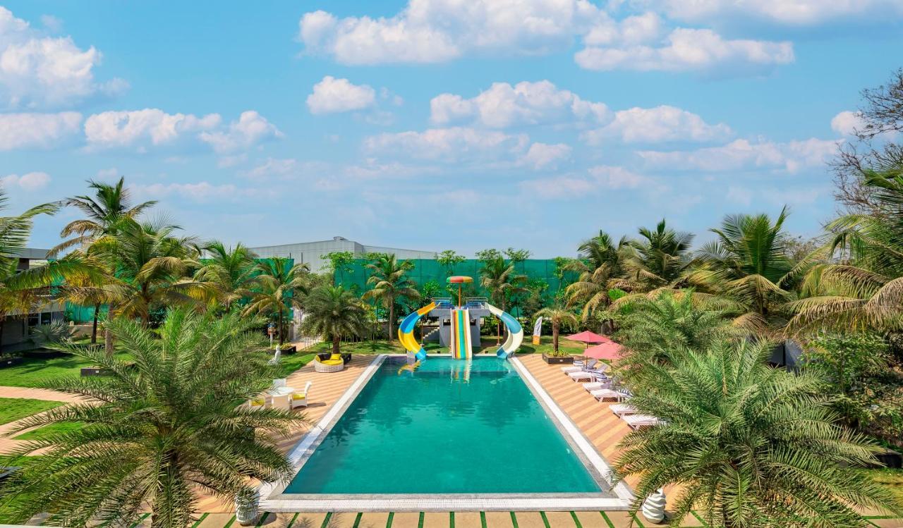 Saffronstays Palm Paradise: Poolside Oasis with Slides and Games Padghe Exterior photo