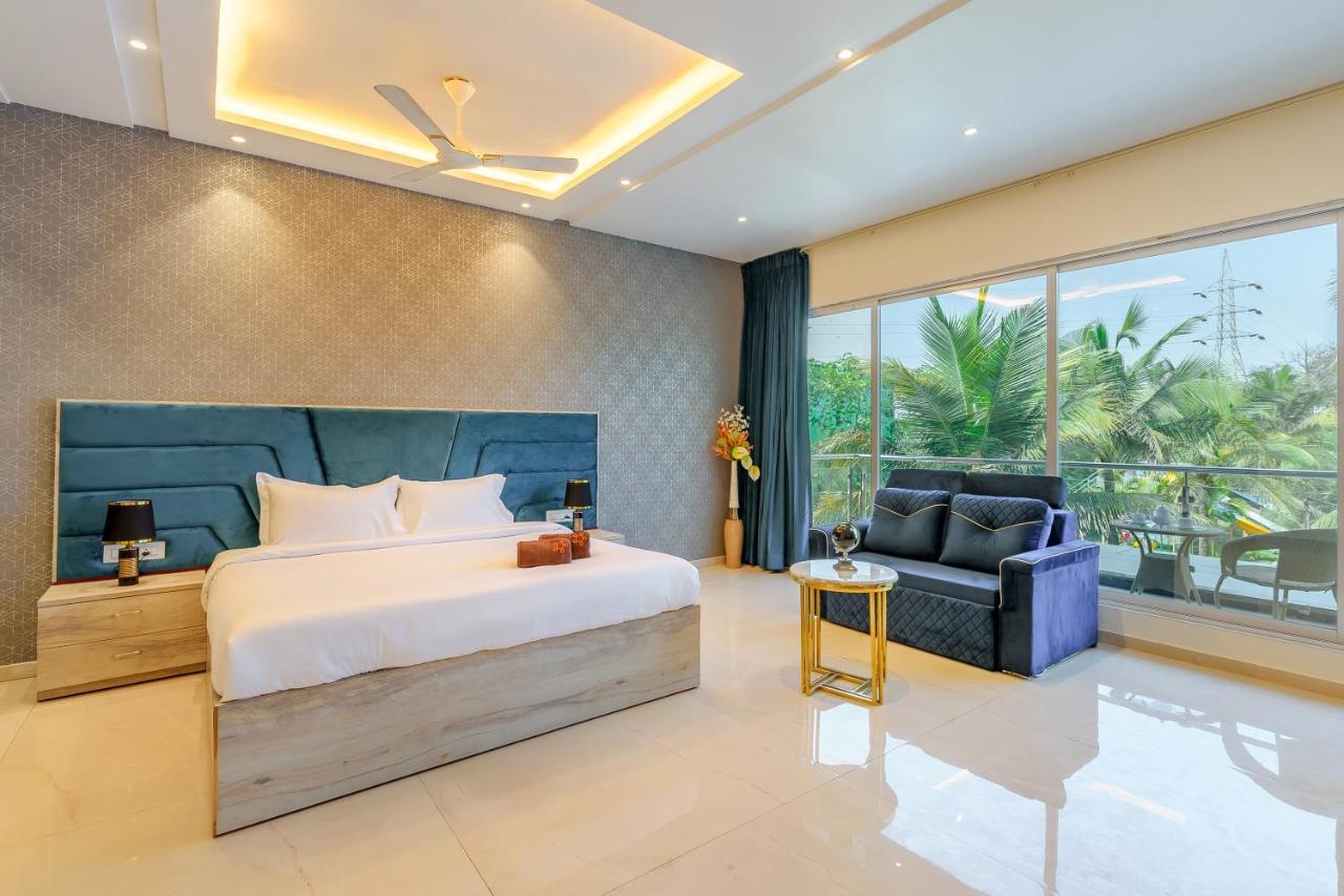 Saffronstays Palm Paradise: Poolside Oasis with Slides and Games Padghe Exterior photo