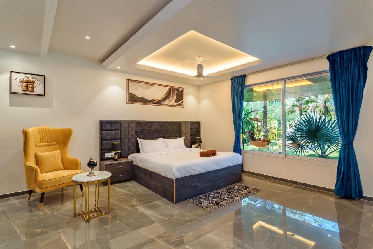 Saffronstays Palm Paradise: Poolside Oasis with Slides and Games Padghe Exterior photo