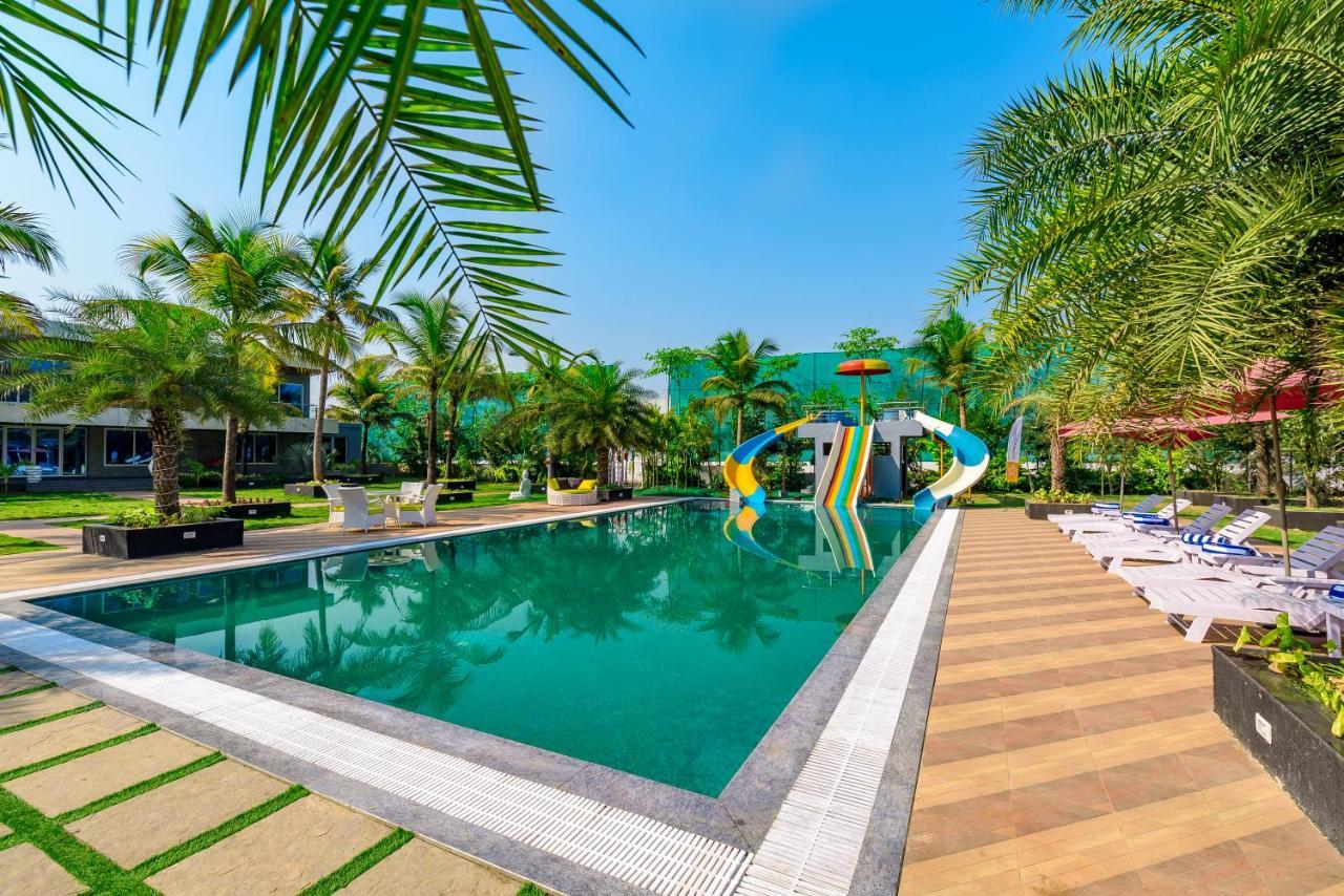 Saffronstays Palm Paradise: Poolside Oasis with Slides and Games Padghe Exterior photo