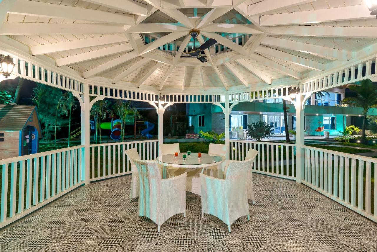 Saffronstays Palm Paradise: Poolside Oasis with Slides and Games Padghe Exterior photo